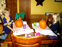 Adi & Matthew painting their pumkins 2010